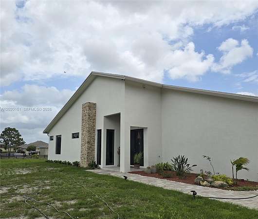 5 Acres of Land with Home for Sale in Loxahatchee Groves, Florida