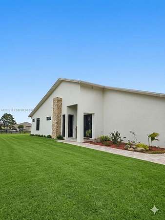 5 Acres of Land with Home for Sale in Loxahatchee Groves, Florida