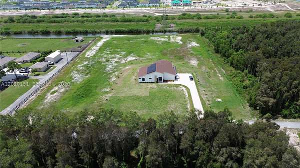 5 Acres of Land with Home for Sale in Loxahatchee Groves, Florida