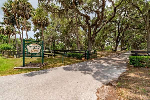 129 Acres of Agricultural Land with Home for Sale in Reddick, Florida