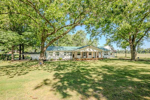 4.5 Acres of Land with Home for Sale in Cypress Inn, Tennessee