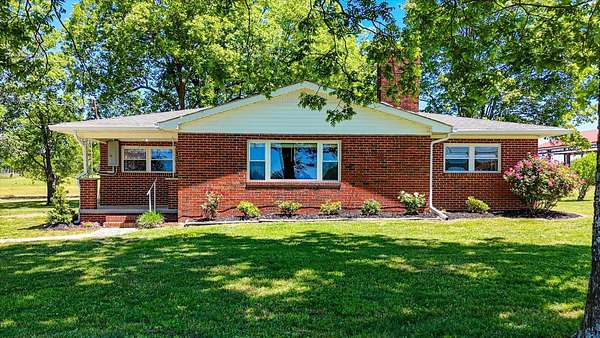 5 Acres of Land with Home for Sale in Cleveland, Tennessee