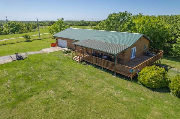 10 Acres of Land with Home for Sale in Cassville, Missouri