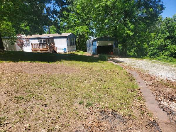 3.16 Acres of Land with Home for Sale in Highlandville, Missouri