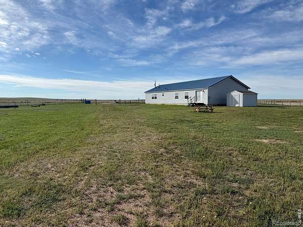 79 Acres of Agricultural Land with Home for Sale in Briggsdale, Colorado