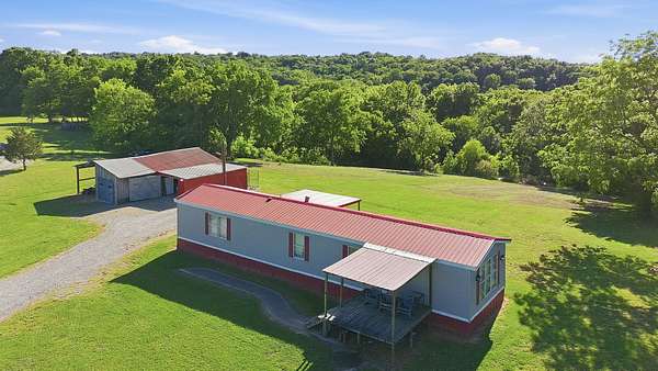 11.3 Acres of Recreational Land with Home for Sale in Mount Pleasant, Tennessee