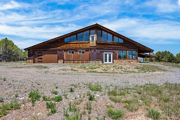 40 Acres of Land with Home for Sale in Montrose, Colorado