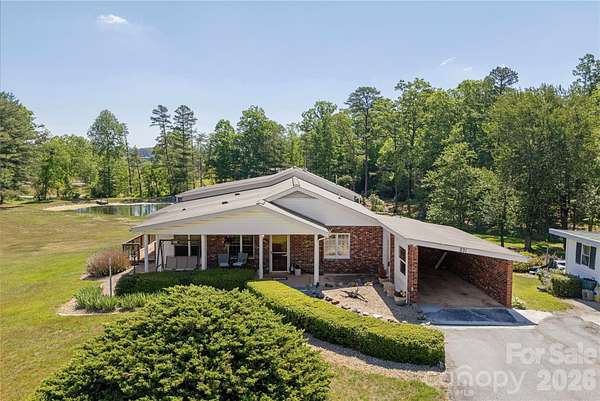 5.18 Acres of Land with Home for Sale in East Flat Rock, North Carolina