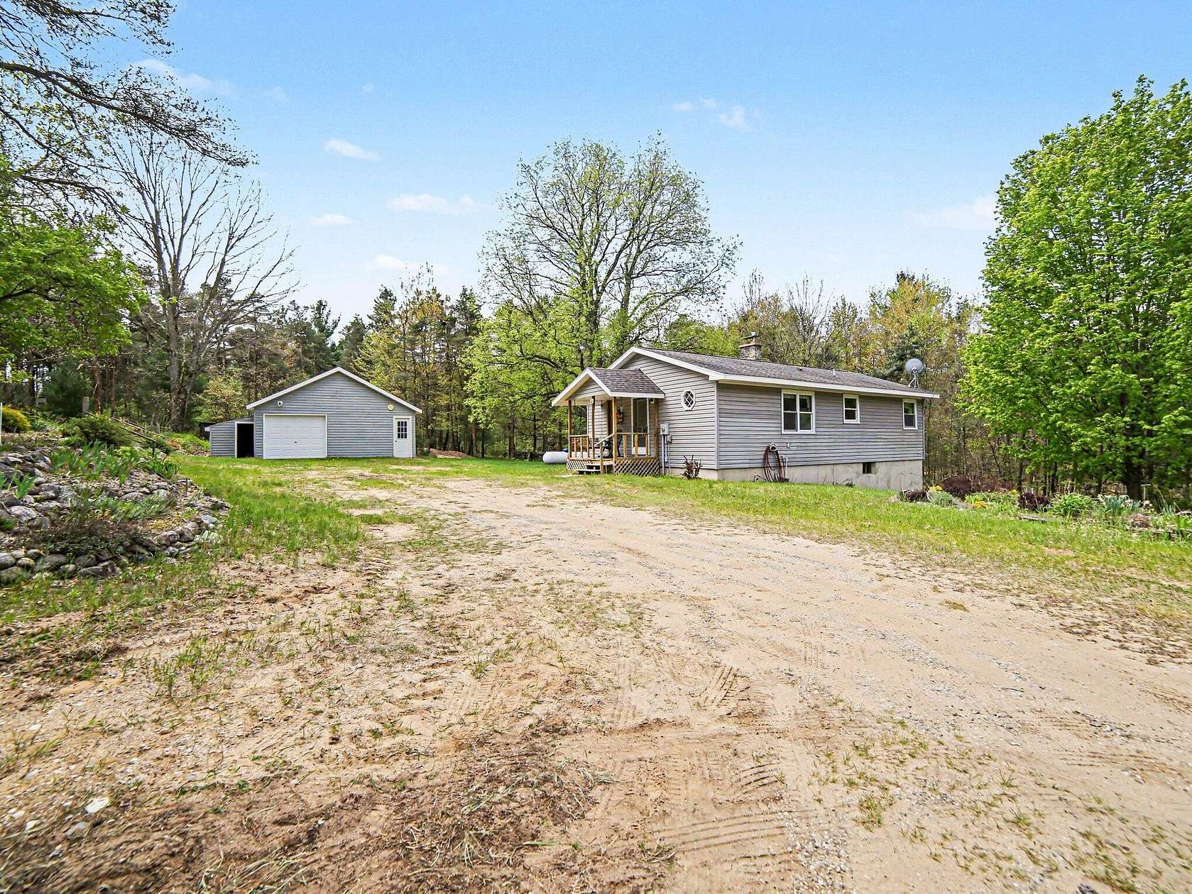 10 Acres of Recreational Land with Home for Sale in Hesperia, Michigan