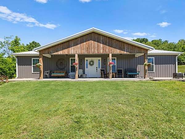 10.3 Acres of Land with Home for Sale in Providence, Kentucky
