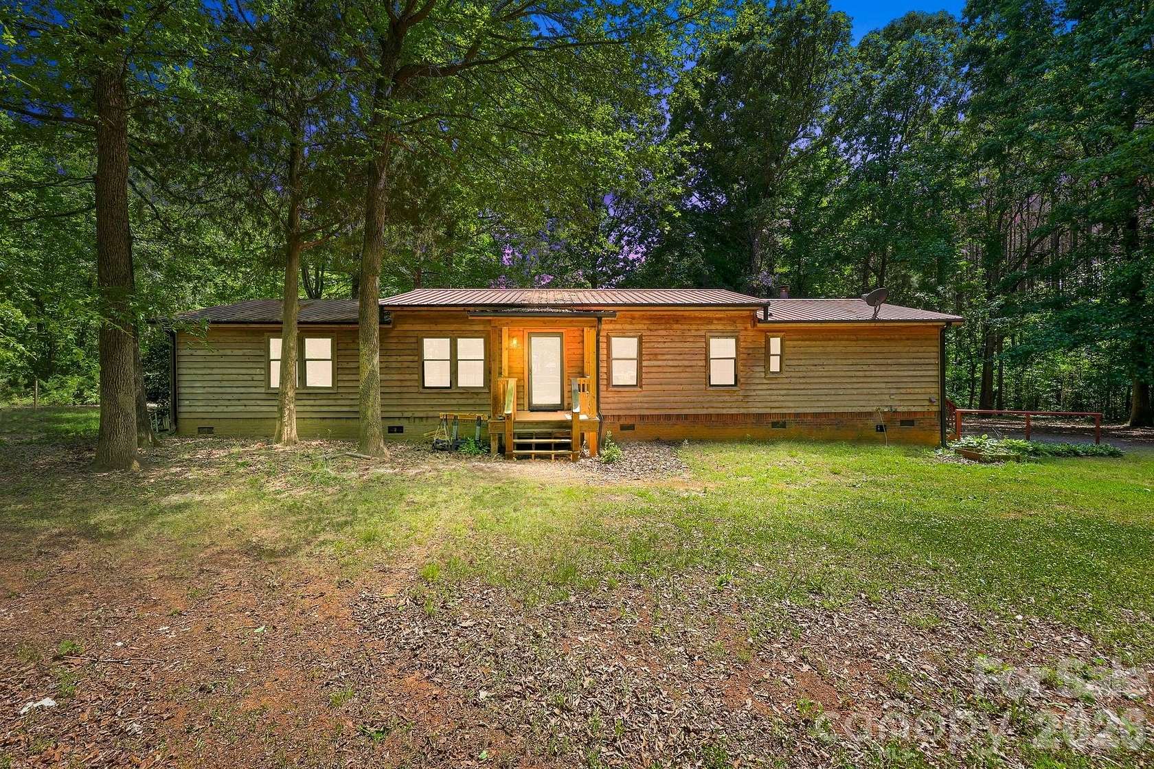 5.64 Acres of Land with Home for Sale in Woodleaf, North Carolina