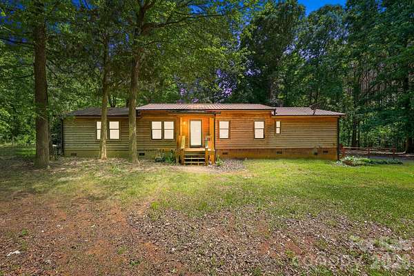 5.64 Acres of Land with Home for Sale in Woodleaf, North Carolina