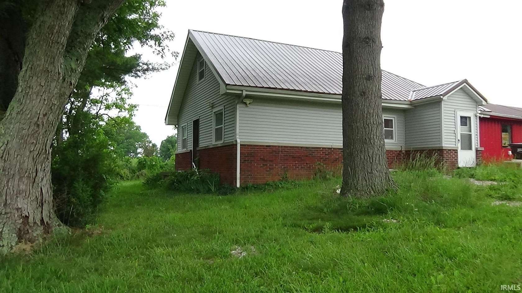 8 Acres of Land with Home for Sale in Bedford, Indiana