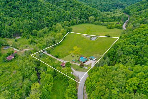 9.48 Acres of Land with Home for Sale in Oneida, Kentucky