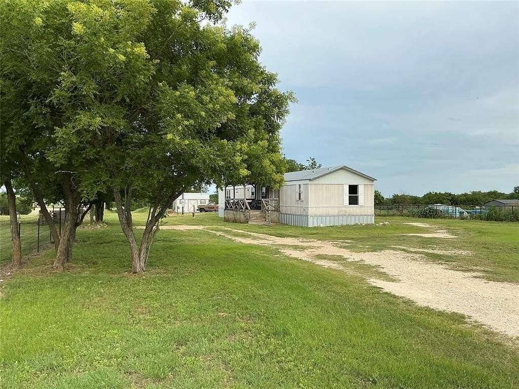 1.56 Acres of Land with Home for Sale in Oglesby, Texas