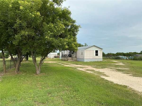 1.56 Acres of Land with Home for Sale in Oglesby, Texas
