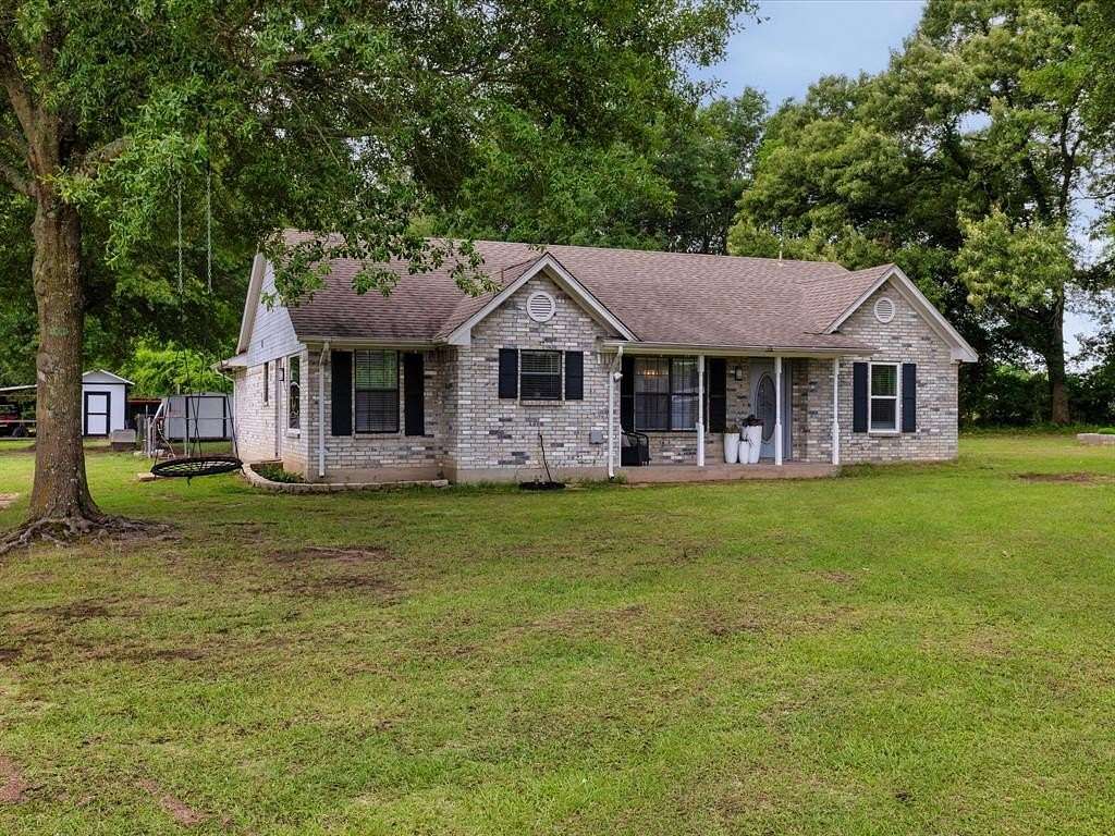 10.2 Acres of Land with Home for Sale in Emory, Texas