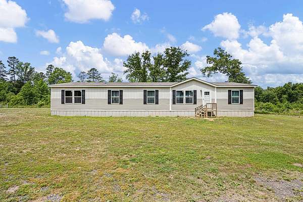10.8 Acres of Land with Home for Sale in Casa, Arkansas