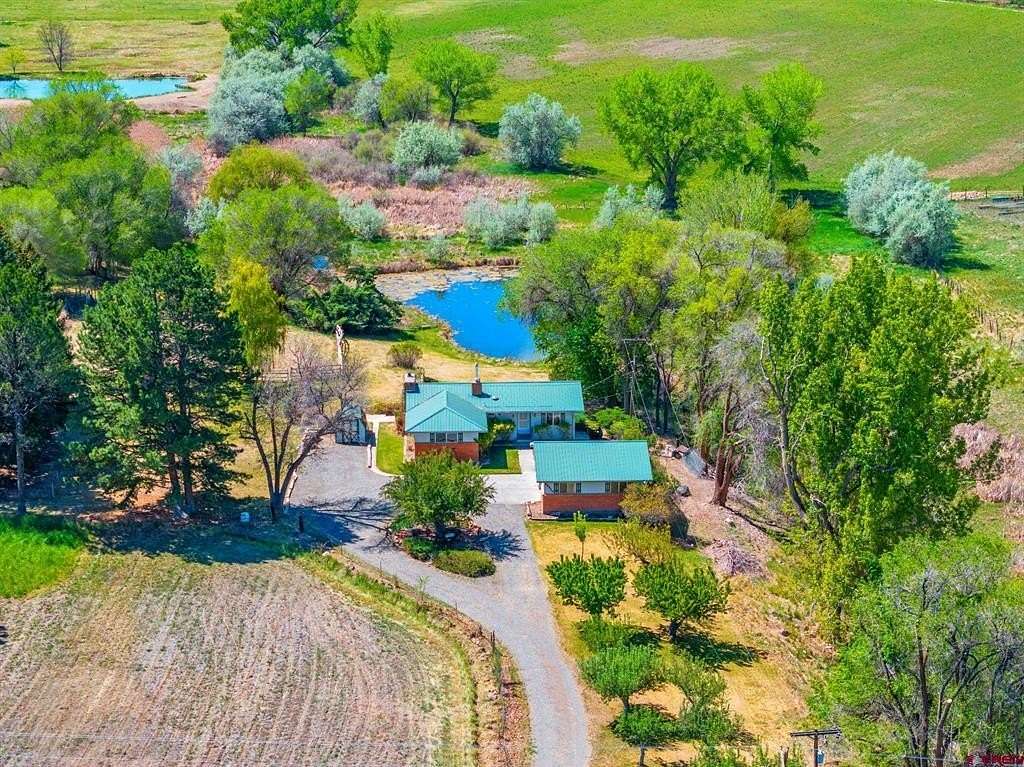 5 Acres of Land with Home for Sale in Montrose, Colorado
