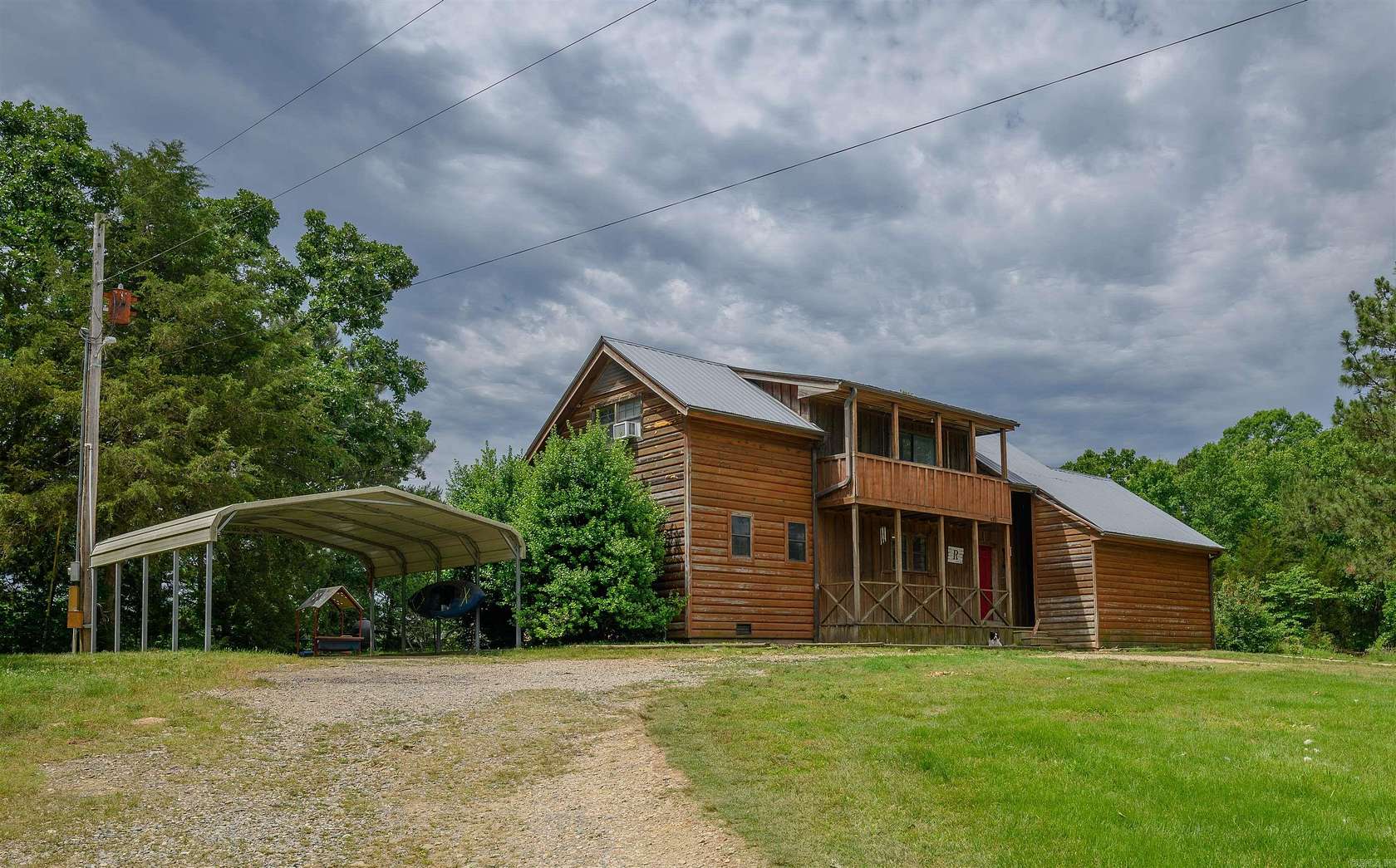 19.3 Acres of Recreational Land with Home for Sale in Cove, Arkansas