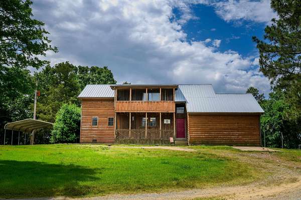 19 Acres of Land with Home for Sale in Cove, Arkansas