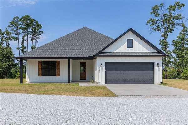 5 Acres of Land with Home for Sale in Rogers, Arkansas