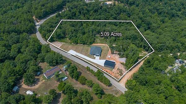 5 Acres of Land with Home for Sale in Rogers, Arkansas