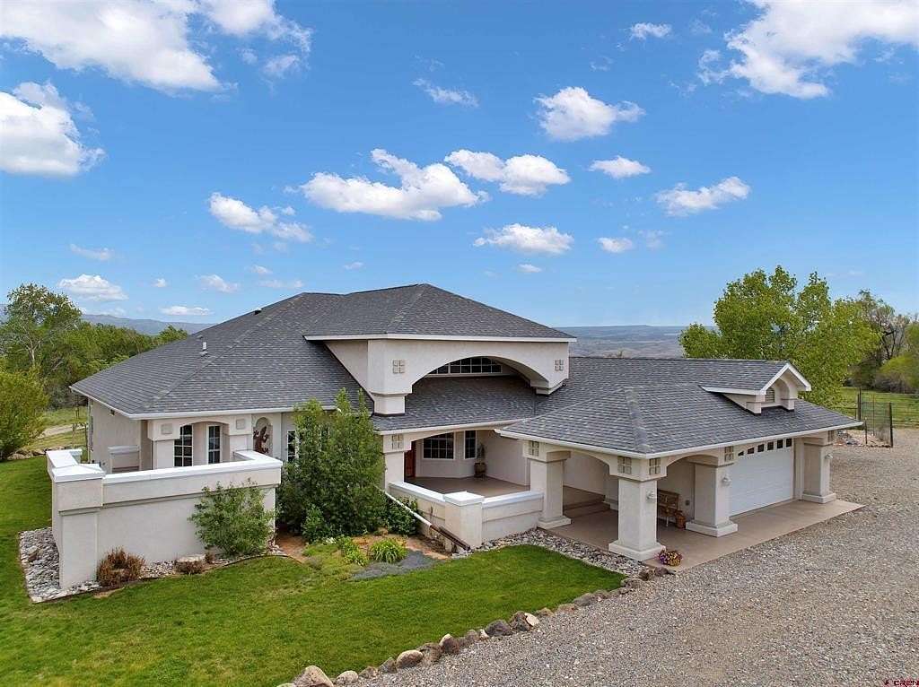 8.22 Acres of Land with Home for Sale in Hotchkiss, Colorado