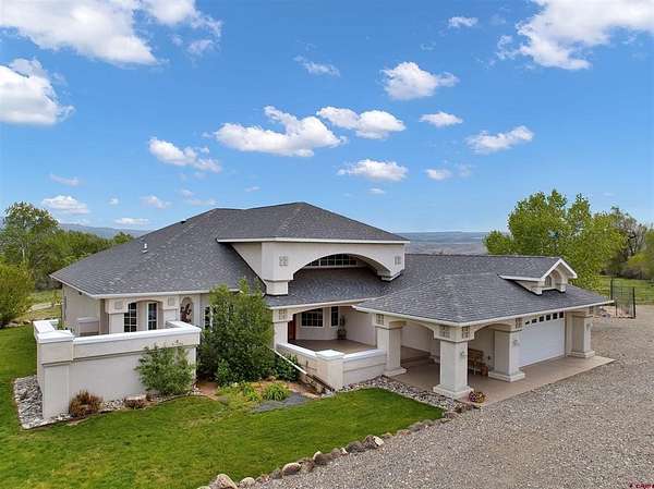 8.22 Acres of Land with Home for Sale in Hotchkiss, Colorado