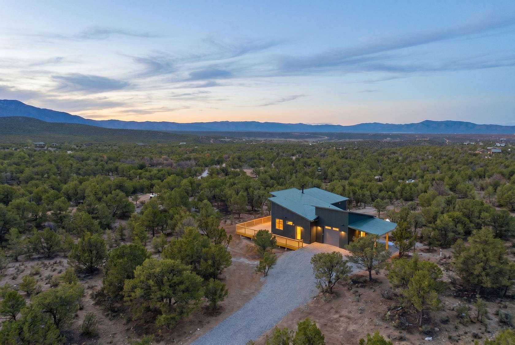 3.25 Acres of Land with Home for Sale in Arroyo Hondo, New Mexico