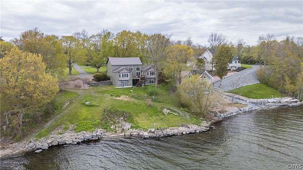 1.6 Acres of Land with Home for Sale in Three Mile Bay, New York