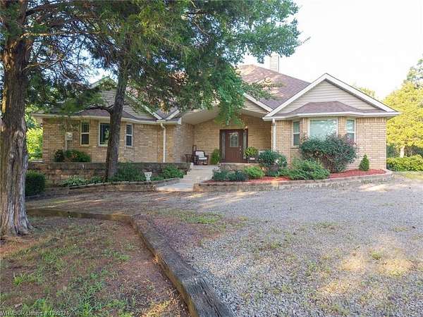 5 Acres of Land with Home for Sale in Muldrow, Oklahoma
