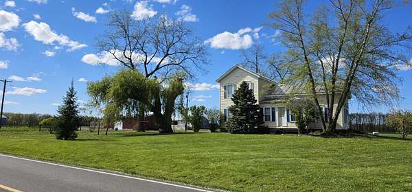 4 Acres of Land with Home for Sale in Ronald Township, Michigan