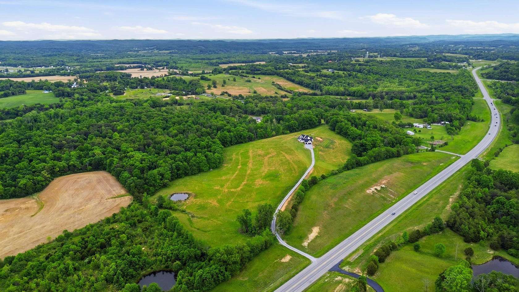 27 Acres of Land with Home for Sale in Crab Orchard, Kentucky