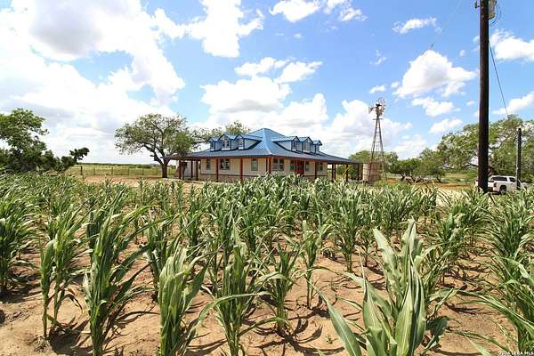 20.7 Acres of Agricultural Land with Home for Sale in Floresville, Texas