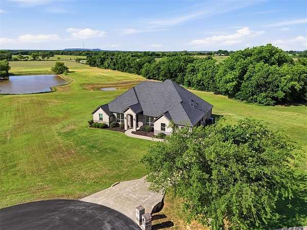 2.33 Acres of Land with Home for Sale in Granbury, Texas