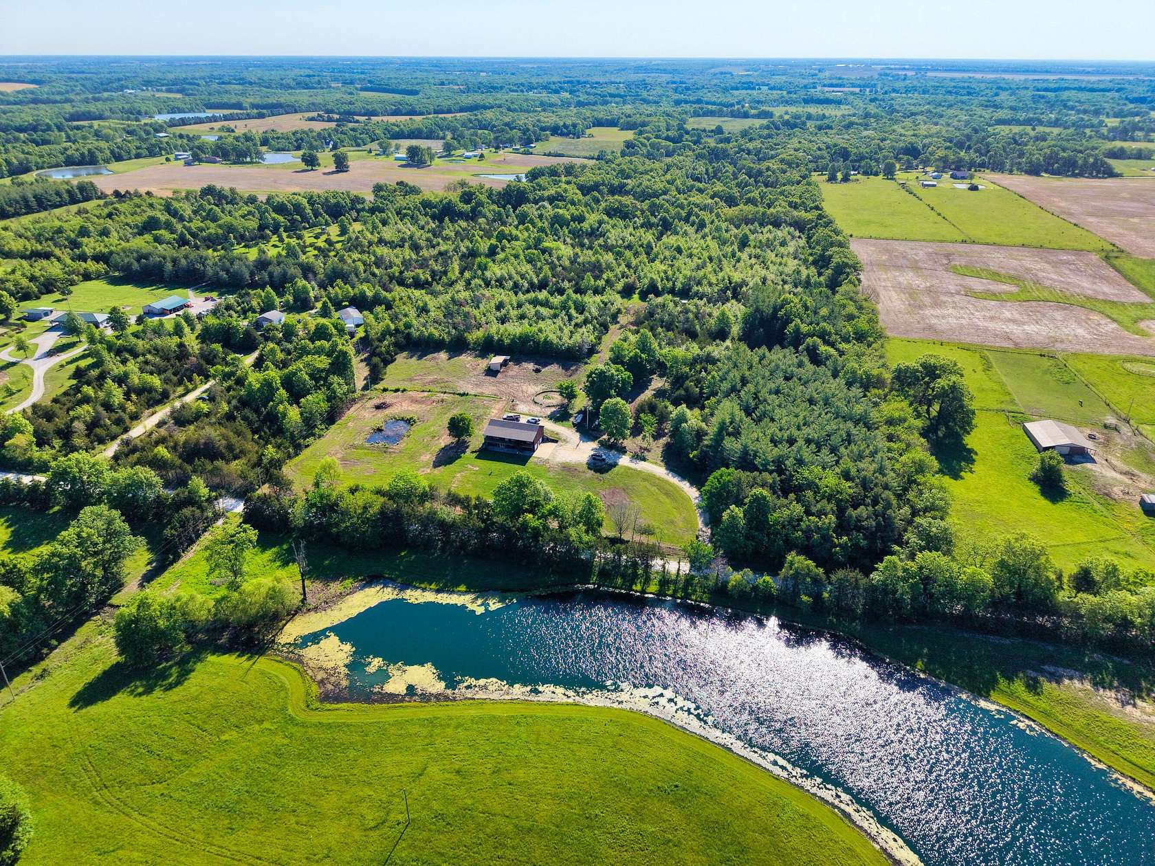 20.3 Acres of Land with Home for Sale in Hallsville, Missouri