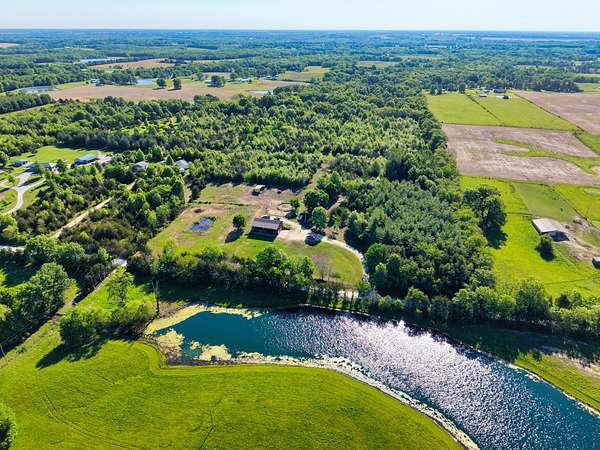 20.3 Acres of Land with Home for Sale in Hallsville, Missouri
