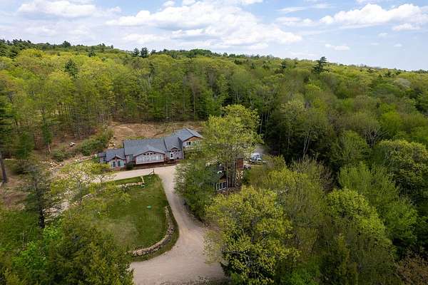 5.6 Acres of Land with Home for Sale in Gilmanton, New Hampshire