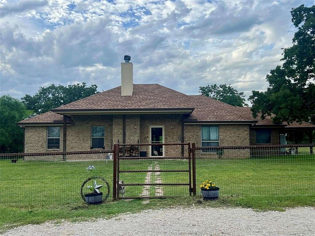 6.35 Acres of Land with Home for Sale in May, Texas