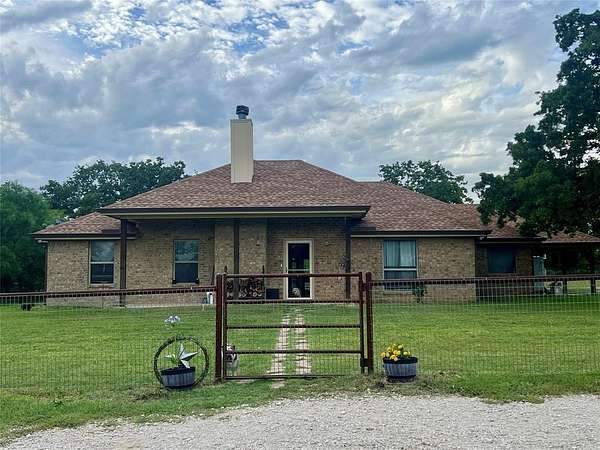 6.35 Acres of Land with Home for Sale in May, Texas
