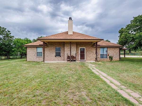 6.35 Acres of Land with Home for Sale in May, Texas