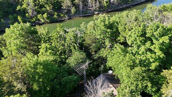 0.57 Acres of Land with Home for Sale in Eagle Rock, Missouri