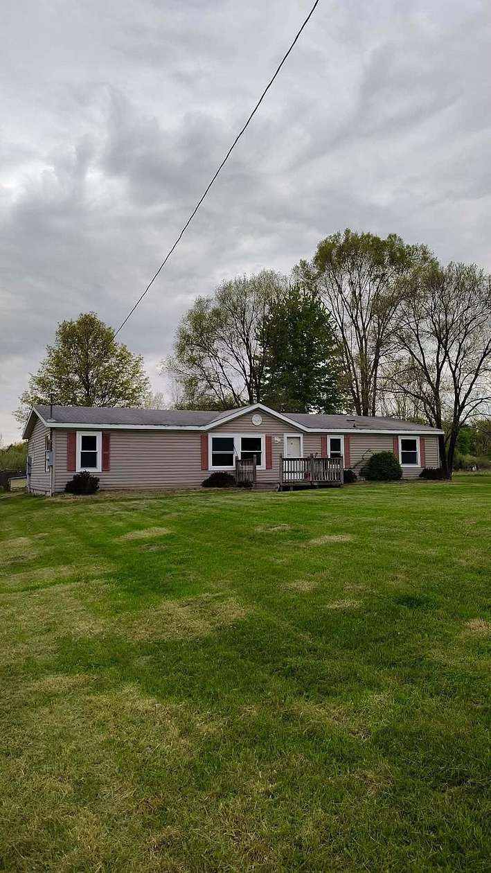 5.69 Acres of Land with Home for Sale in St. Charles, Michigan