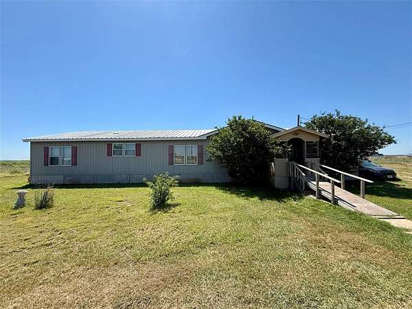 12.3 Acres of Land with Home for Sale in Merkel, Texas