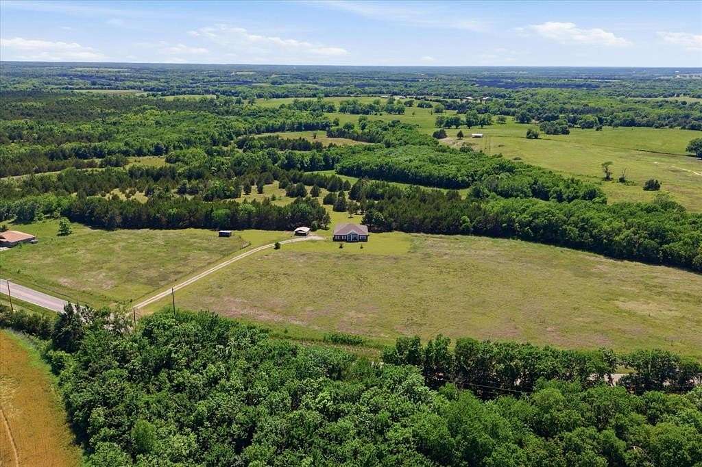 20.3 Acres of Recreational Land with Home for Sale in Bonham, Texas