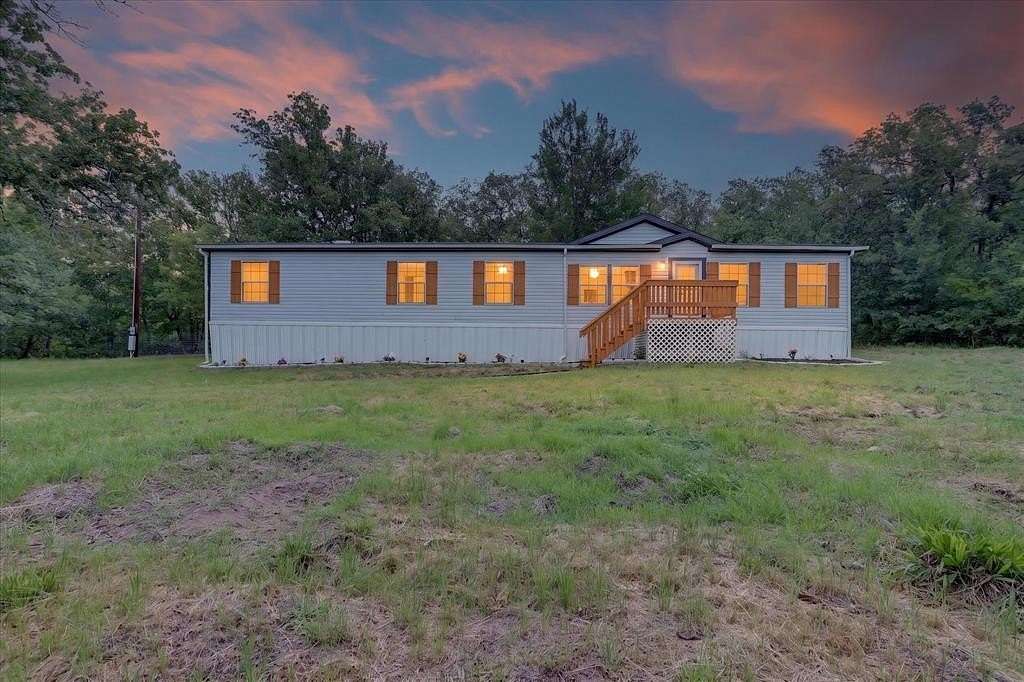 10.5 Acres of Land with Home for Sale in Springtown, Texas
