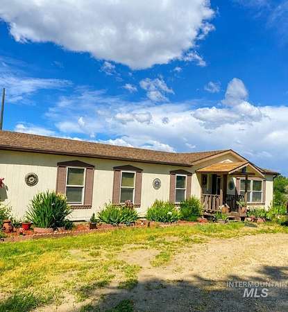 31.9 Acres of Agricultural Land with Home for Sale in Nampa, Idaho