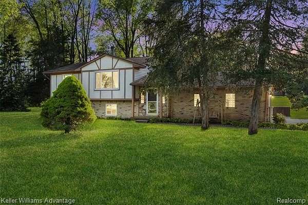 1.5 Acres of Land with Home for Sale in Highland Township, Michigan