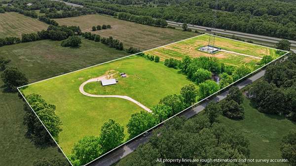 10.5 Acres of Land with Home for Sale in Bois D'Arc, Missouri